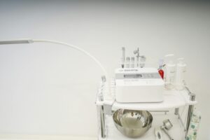 High-tech skincare device setup for advanced beauty treatment in clinic.